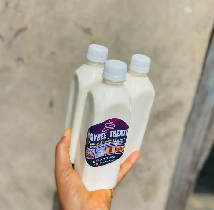 Three bottles of KayBee Treats drinks