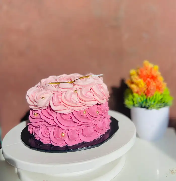 Pink ombre rosette cake with gold pearls